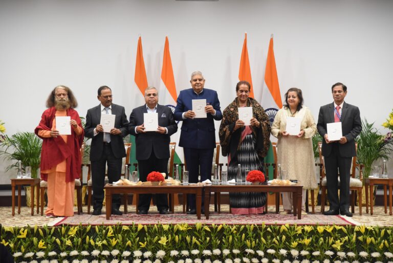Swami Chidanand Saraswati, Mr. Ajit Doval, Mr. Ashok P. Hinduja, Shri Jagdeep Dhankhar, Dr. Sudesh Dhankhar, Ms. Harsha Hinduja and Mr. Sunil Gupta at the book launch